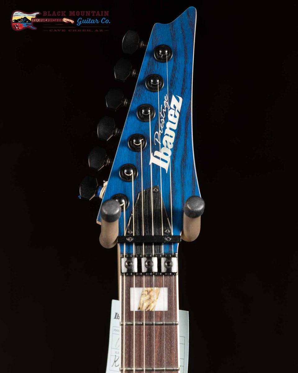 Ibanez RG653DX Prestige -Transparent Deep Blue Flat (New)| Black
