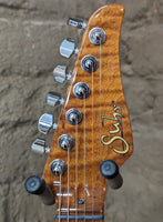 
              Suhr Modern, Right-handed - Figured Walnut w/ Roasted Flame Maple Neck (New)
            