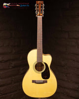 
              Martin Custom Shop 00-12 Fret Cutaway Italian Alpine Spruce Quilted Maple Back and Sides (New) REVERB
            