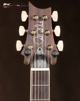 
              PRS McCarty 594 Custom Color- Black Rainbow Holoflake Top with Metallic Red Back (New)
            